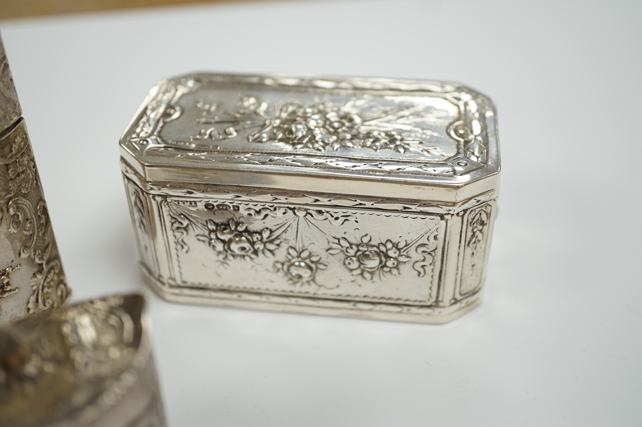 Three assorted late 19th century Dutch white metal boxes, largest 80mm.